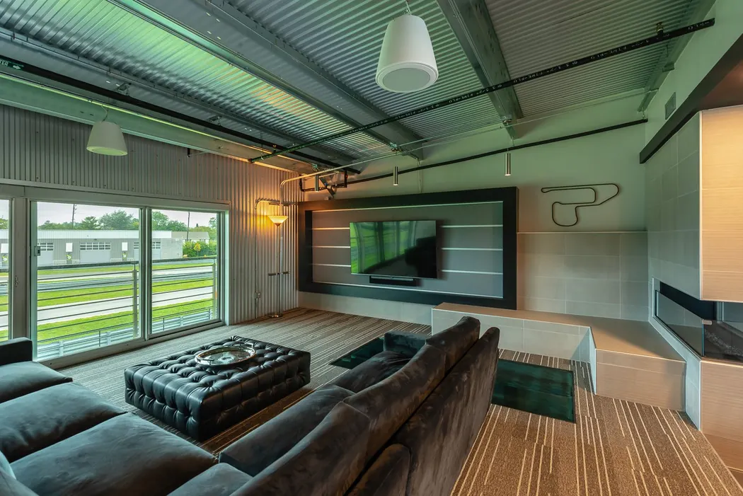 Private club lounge overlooking a track