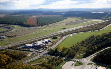 Aerial view of the Lausitzring site with the test oval and pit building